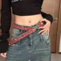 Y2K red plaid canvas belt with colorful flower grommets, fashionable street style waist strap. - Red Plaid