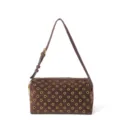 Brown suede shoulder bag detailed with golden eyelets and rivets for a retro punk look. - 27*14*14 / Brown and Gold