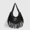 Trendy black leather shoulder bag with metallic studs and stylish fringes for women. - Black