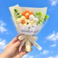 Handmade knitted crochet flower bouquet close up, vibrant yellow and white floral gift detail. - Three Puff Flowers Bouquet / Yellow