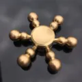 Brass fidget spinner detail shot, metal stress relief toy closeup, smooth spinning bearing. - Pure Copper Detachable - CT-06 Gourd Model