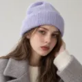 Close-up view of the cozy wool blend knitted beanie detail, soft texture and warm fit. - S (54-56cm) / Mist Purple