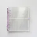 Transparent 6-ring binder cover detail shot with purple metal rings and snap button closure. - 5 Inch 6 Holes / Purple