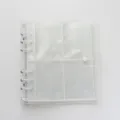Detalle de archivador de fototargetas de 6 anillas de PVC transparente con anillas metálicas. - 3 Pulgadas 6 Agujeros / Blanco