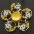 Gold metal fidget spinner with cute panda and bamboo enamel pattern, stress relief toy variant. - Cartoon Gold Panda Bamboo Forest