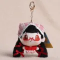 Cute anime girl plush keychain with red bowknot, soft stuffed doll pendant for bags keys. - Big Eye Cute Doll Pendant Black