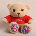 Cute plush teddy bear toy doll wearing a red London souvenir sweater with Union Jack foot pads. - London Bear Doll - Red Hoodie / Approx 15cm