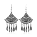 Vintage silver bohemian long tassel earrings with intricate cutout fan design and drops. - 6