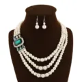 Elegante multi-layer kunstparel ketting set met prachtige groene kristal en oorbellen. - Groen