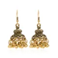Vintage gouden Indiase jhumka oorbellen voor dames, etnische metalen kwast oorbellen. - Antiek Goud