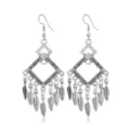 Vintage bohemian alloy long tassel earrings featuring geometric diamond and feather fringe design. - Style 8