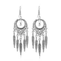 Close-up detail of vintage silver bohemian dreamcatcher feather tassel dangle earrings design. - Style 7
