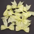 Yellow polyester double layer swallowtail bows for DIY hair clips and gift packaging. - 2.5cm Width (10 Pieces/Pack) / Yellow