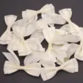 Polyester double layer swallowtail ribbon bows for DIY gift wrapping and clothing parts - 2.5cm Width (10 Pieces/Pack) / Off White