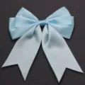 Close-up detail of light blue polyester double-layer bow accessory for DIY crafts and gifts. - 4cm Width (10 Pieces/Pack) / Blue