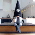 Knitted faceless gnome doll holding cup holiday Christmas home decor sitting ornament - Grey Female
