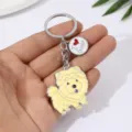 Llavero de metal con diseño de perro chow chow amarillo y dije de corazón para bolsos. - Chow-Chow Crema