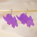 Pendientes de clip de dinosaurio de acrílico con purpurina morada para niños y mujeres, joyería bonita. - 1