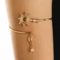 Detail shot of the vintage gold arm cuff featuring sun, moon, and star charms for women. - KC Gold Vintage Sun Moon and Stars Style (10KC金 1374)