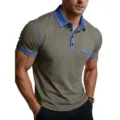 Close-up detail of mens contrast color polo shirt collar, blue trim and pocket design. - S / Tops / Khaki