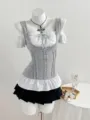 Y2K grey corset top with white off-shoulder sleeves and black pleated mini skirt set. - Light Grey and White