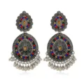 Close-up detail of antique silver carved bohemian ethnic earrings with colorful crystal stones. - Silver Multicolor