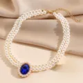 Elegante dubbellaagse parelketting met blauwe kristallen hanger voor dames en meisjes. - Ketting / Blauw