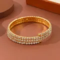Bracciale da braccio dorato a più file di strass bracciale rigido in cristallo donna. - Oro