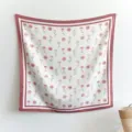 Close-up of elegant pink rose floral print square scarf detail, soft texture aesthetic hanging. - 90FJ330-Pink