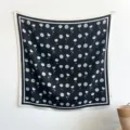 Close up view of black and white floral silk square scarf, elegant design for women daily wear. - 90FJ330 - Black