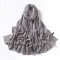 Close-up detail of the elegant grey solid chiffon scarf fabric showing smooth texture and drape. - Agate Grey