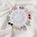 Colorful flower brooch pins in a round wheel organizer, perfect for decorative clothing fix. - Colorful Flower Pin 20pcs