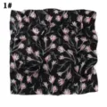 Detailed view of black floral print chiffon square scarf, elegant floral design accessory. - Black Grid Rose