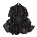 Detailed view of the elegant plaid chiffon scarf, featuring soft lightweight fabric texture. - British Blue Plaid