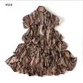 Snake skin print long scarf detail showing soft stretch fabric draped on hanger for fashion look. - Style 24