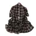 Detailed view of the black and brown plaid chiffon scarf, showing lightweight fabric texture. - Black Beige Plaid