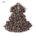Detailed view of long leopard print stretch silk scarf neatly hanging on wooden hanger. - Style 27