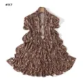 Detailed view of a stylish leopard print long scarf with high elasticity and soft touch. - Colorful Tie-Dye