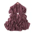 Detailed view of the dark mauve chiffon long scarf draped gracefully on a wooden hanger. - Mulberry Dyed Purple
