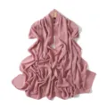 Detailed view showcasing the soft texture and drape of a dusty pink chiffon long scarf. - Peony Pink