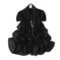 Black sheer chiffon scarf shawl draped on wooden hanger showing texture and drape. - Versatile Black