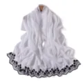 Delicate white chiffon scarf detail featuring exquisite black floral embroidery along the border. - Pure White