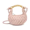 Mini woven leather crossbody bag with unique gold handle, stylish dumpling bag for women. - Pink