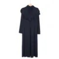 Detailed view of the elegant dark blue long-sleeve modest maxi dress with integrated capelet. - One Size / Dresses / Navy Blue