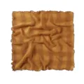 Detail view of the crinkled square scarf showing the soft fabric and lettuce edge. - Turmeric