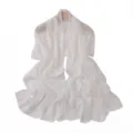 White chiffon scarf detail, featuring shimmering silver threads and delicate pearl embellishments. - Cream White