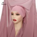 Detailed view of the solid color chiffon hijab scarf and matching under cap set in mauve. - Dusky Pink