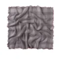 Close-up detail of gray crinkled square scarf with vibrant orange lettuce edge texture. - Light Gray