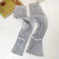 Manchettes de protection solaire plissées grises avec boutons chinois légères et respirantes. - Gris