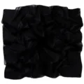 Detail view of a solid black chiffon square scarf, showing soft fabric texture and fine edge. - Classic Black
